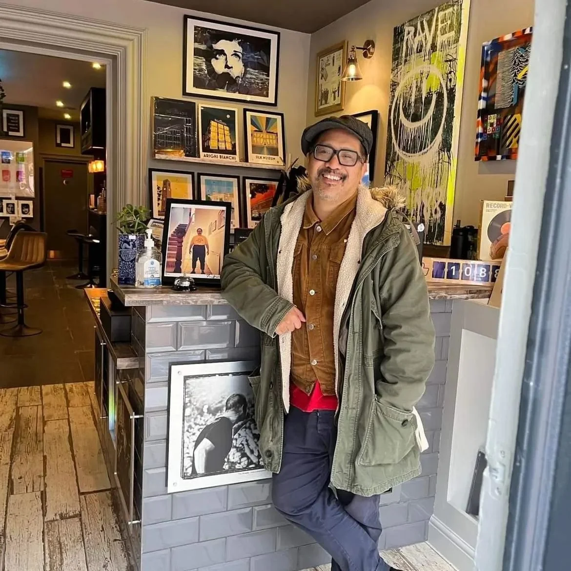 Artwork and visitors inside Proper Sound
