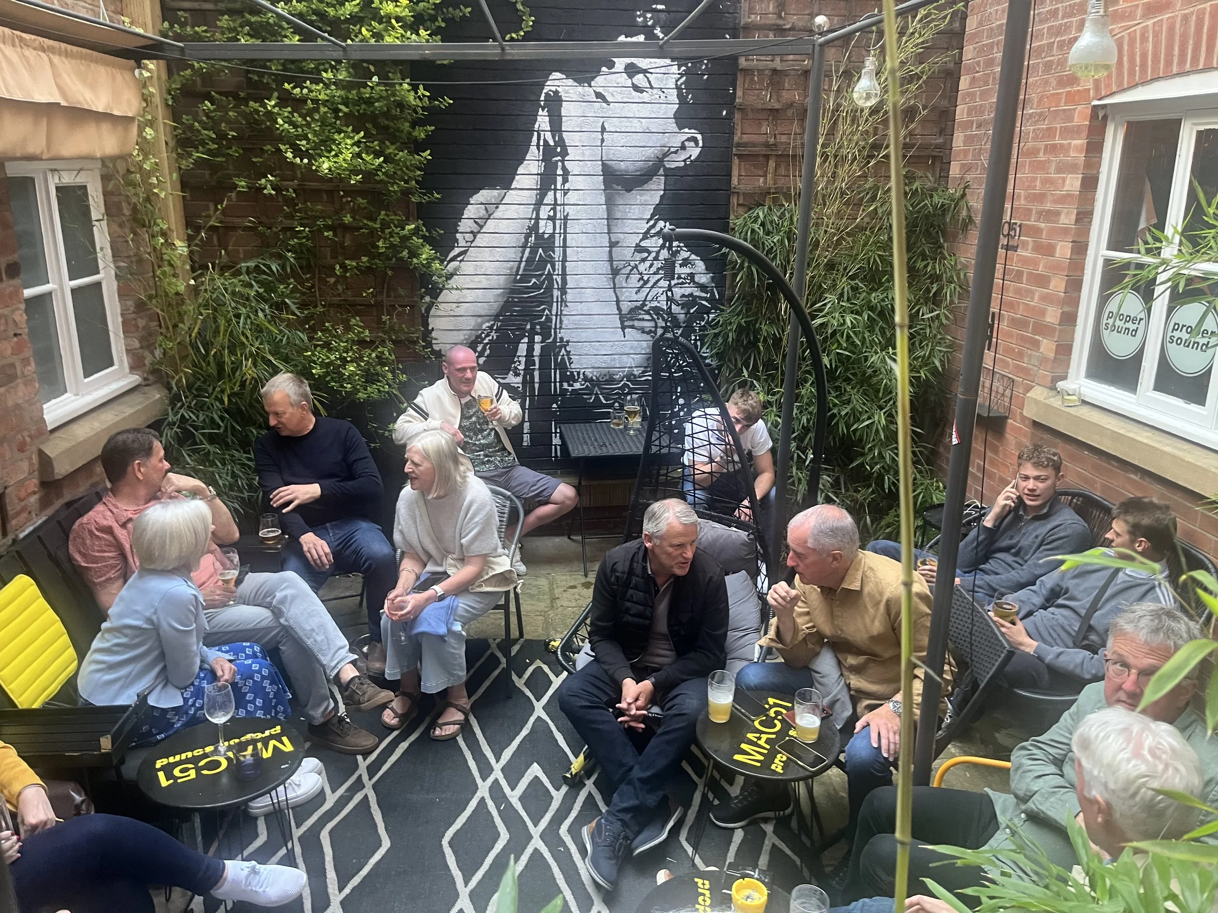 The Proper Sound courtyard and Ian Curtis mural in Macclesfield