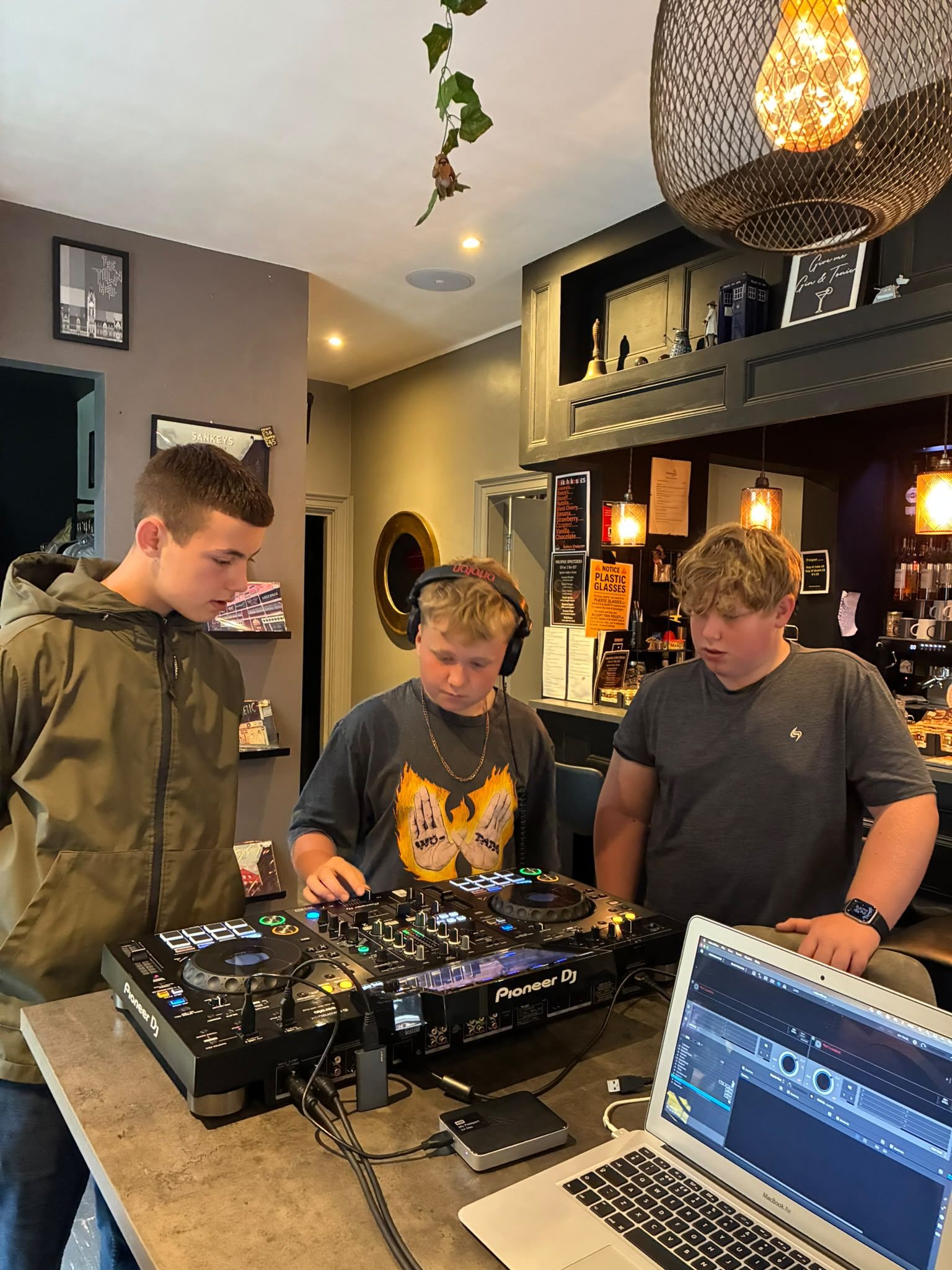 Young people learning to DJ at Proper Sound using Pioneer DJ equipment