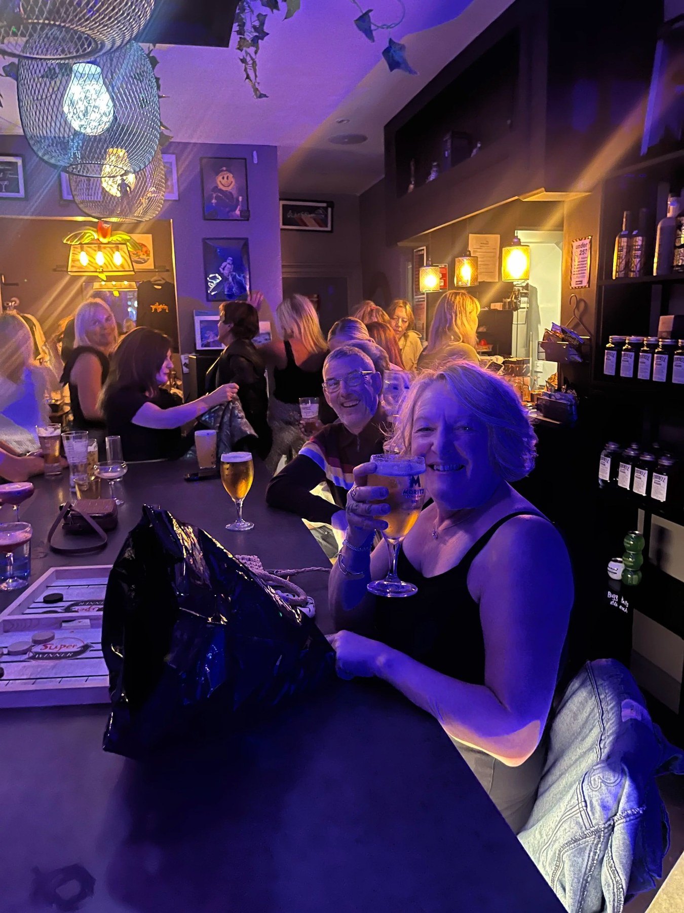 Guests enjoying drinks at a private party inside Proper Sound in Macclesfield